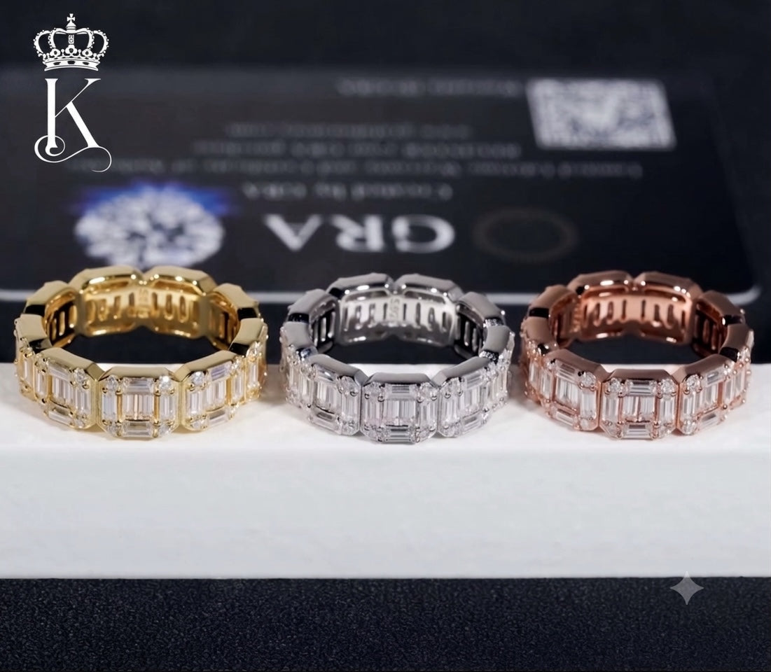Fantastic Jewelry Department eternity band rings in gold, silver, and rose gold with baguette-cut stones.