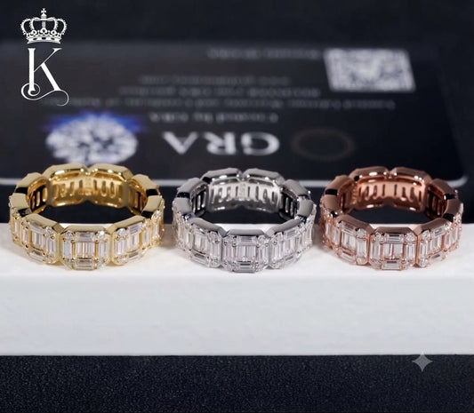 Fantastic Jewelry Department eternity band rings in gold, silver, and rose gold with baguette-cut stones.