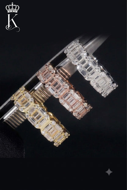 Fantastic Jewelry Department baguette-cut eternity bands in gold, rose gold, and silver with sparkling stones.