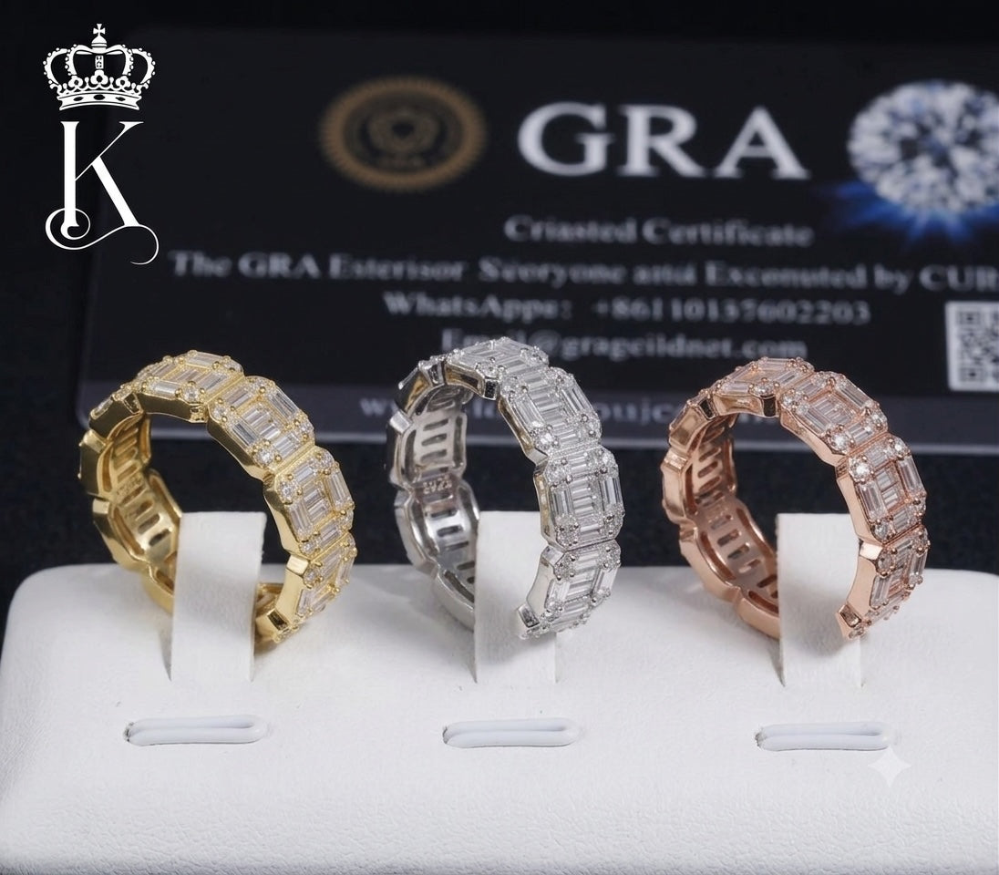 Fantastic Jewelry Department baguette-cut eternity bands in gold, silver, and rose gold with high-clarity stones.