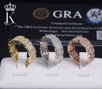 Fantastic Jewelry Department baguette-cut eternity bands in gold, silver, and rose gold with high-clarity stones.